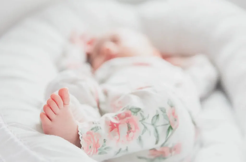 baby sleeping on a wool mattress 
