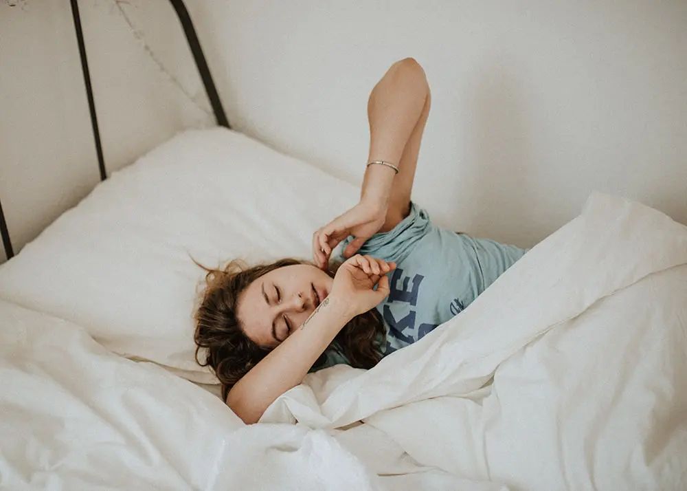 woman laying in bed