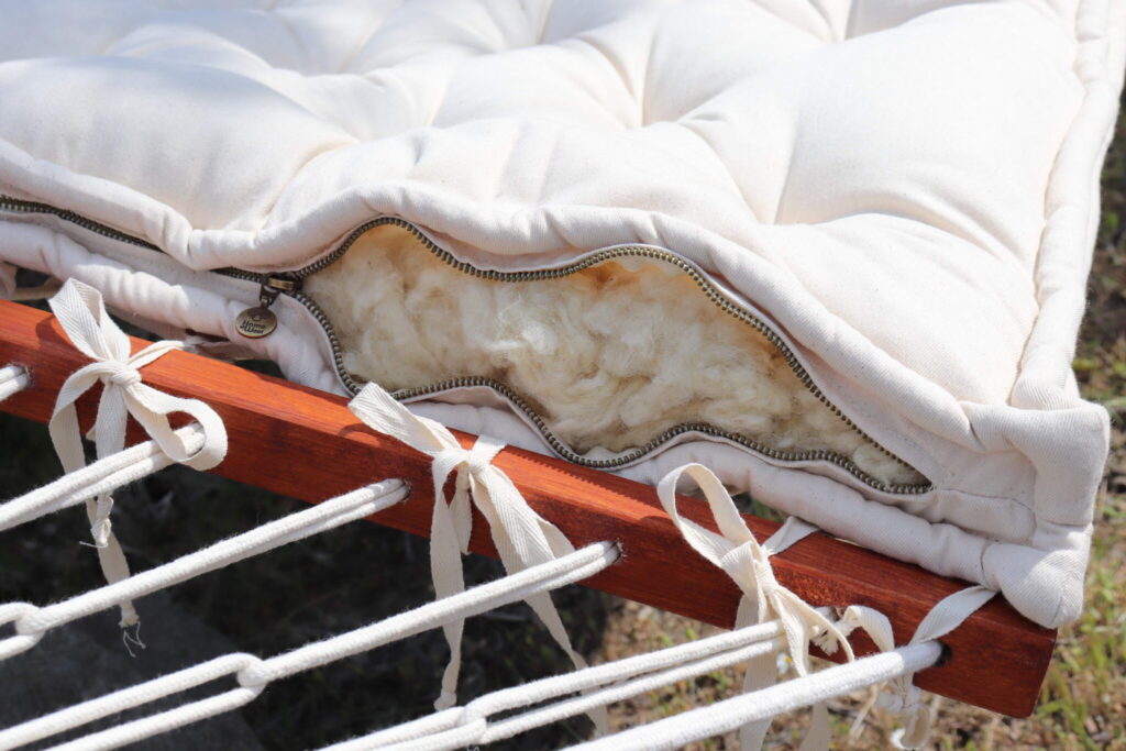 wool hammock cushion open from the side revealing wool inside