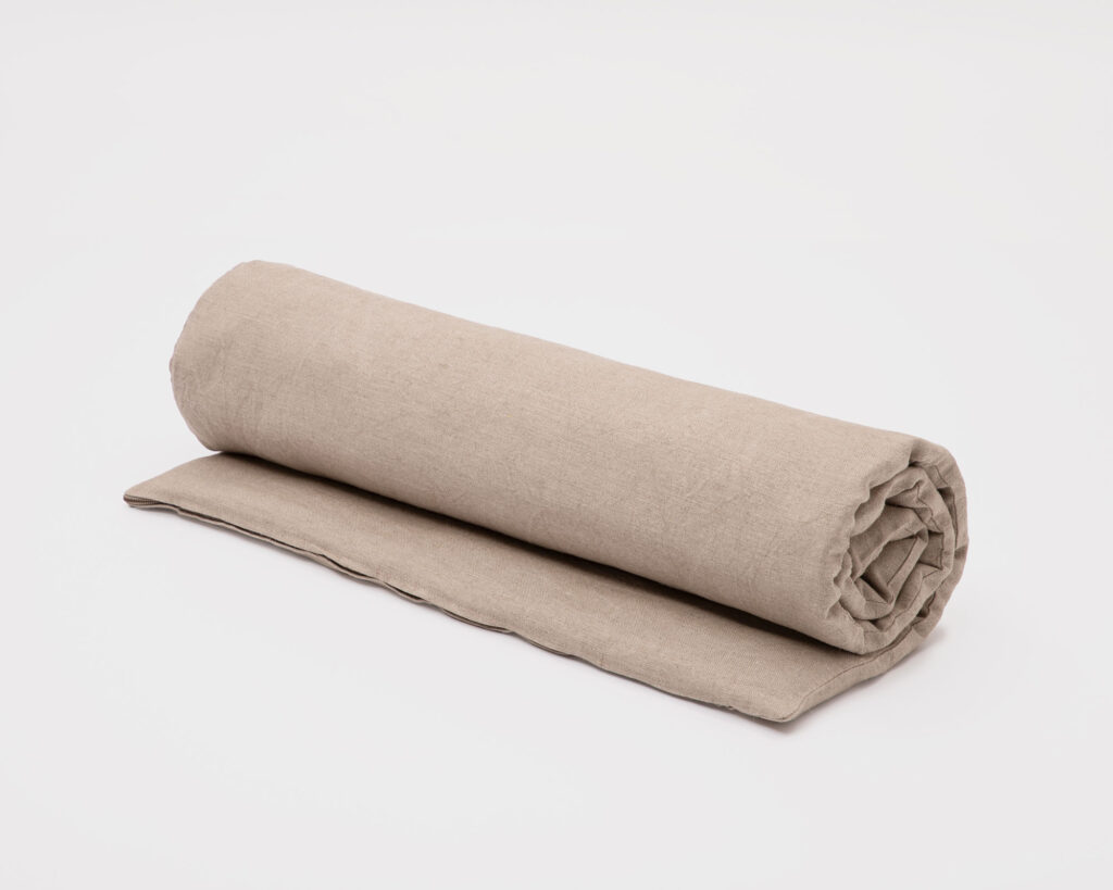 навита вълнена постелка за пилатес Home of Wool